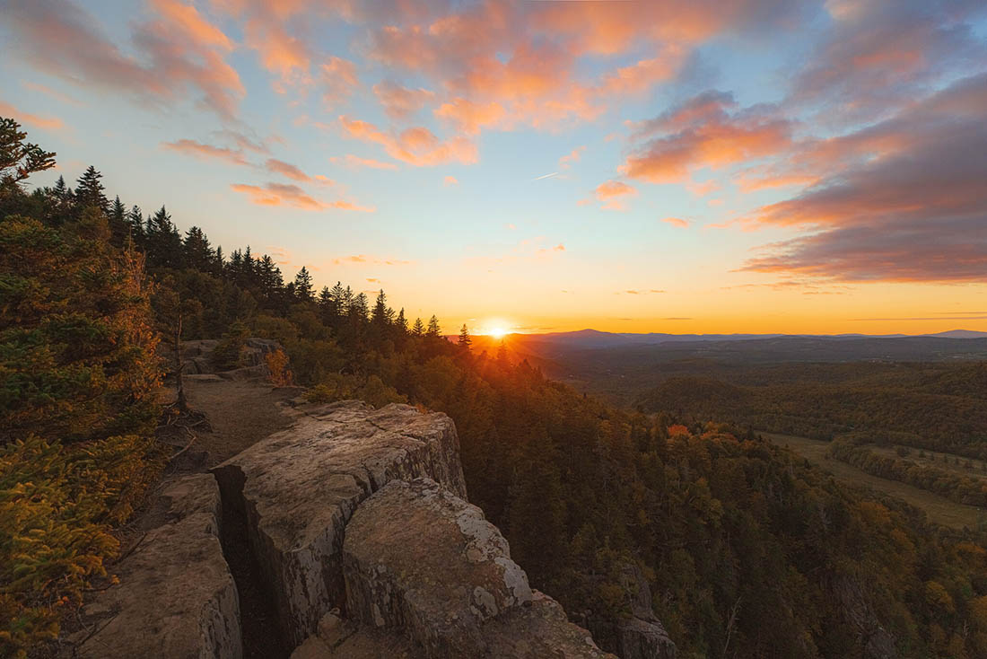 aerial view of a mountain at sunset