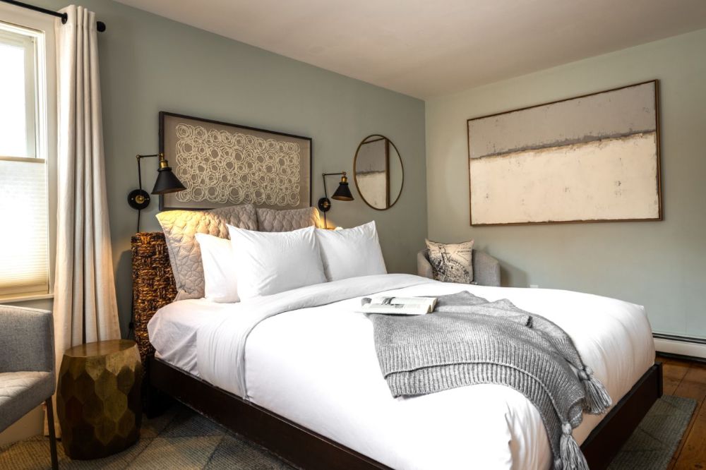 Queen bed in Room 1 at The Sailmaker's House.