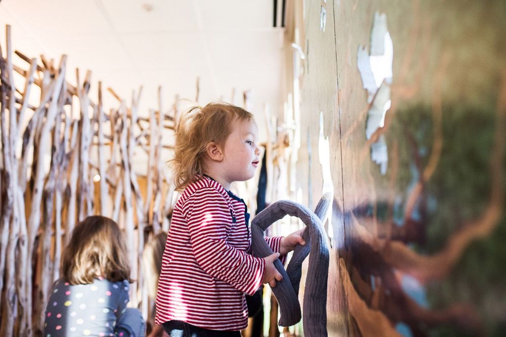 The Children's Museum of New Hampshire overlooks the Cochecho River in downtown Dover, and kids can play in a series of nature inspired exhibits including a giant osprey nest, beaver dams, "fishing" poles, a fish ladder, and even a gundalow (flat bottomed boat historically used on the river). Photo courtesy of taraphotography.com