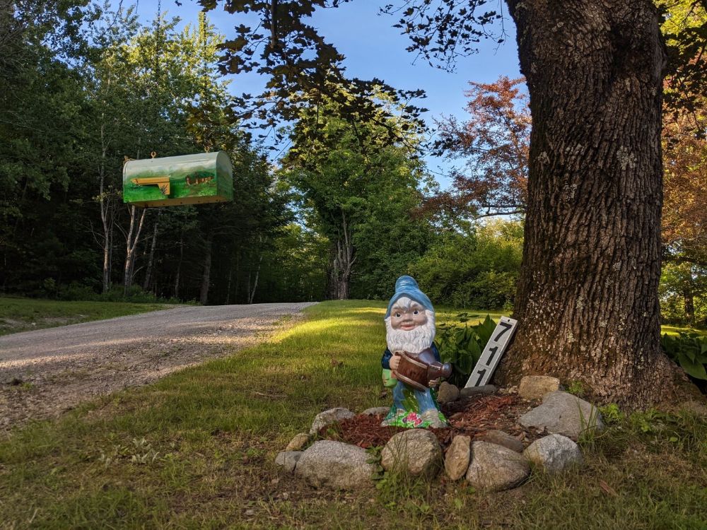 My (Katrine Dionne) repainted gnome project and some help from my sister (Kallie Dionne) to repaint the mailbox with the likeness of The Sandwich Creamery; a local delight right down the street from the B&B