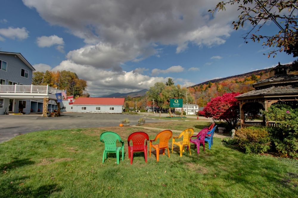 Chairs and gazebo with QI sign.jpg