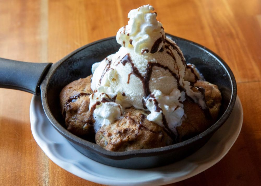 Mama Karen's Skillet Cookie with homemade vanilla ice cream