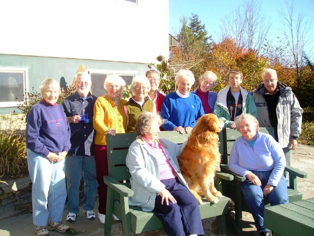Reunion group poses on patio at Coppertoppe Inn, Newfound Lake, NH