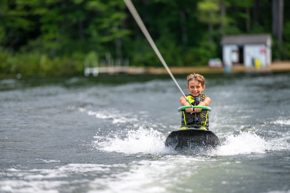 Private waterskiing and kneeboarding sessions are offered for summer guests at Purity Spring Resort