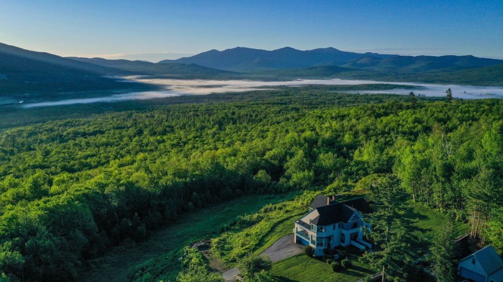 Spring view from Bray Hill looking southeast over the house at The Presidential Range.