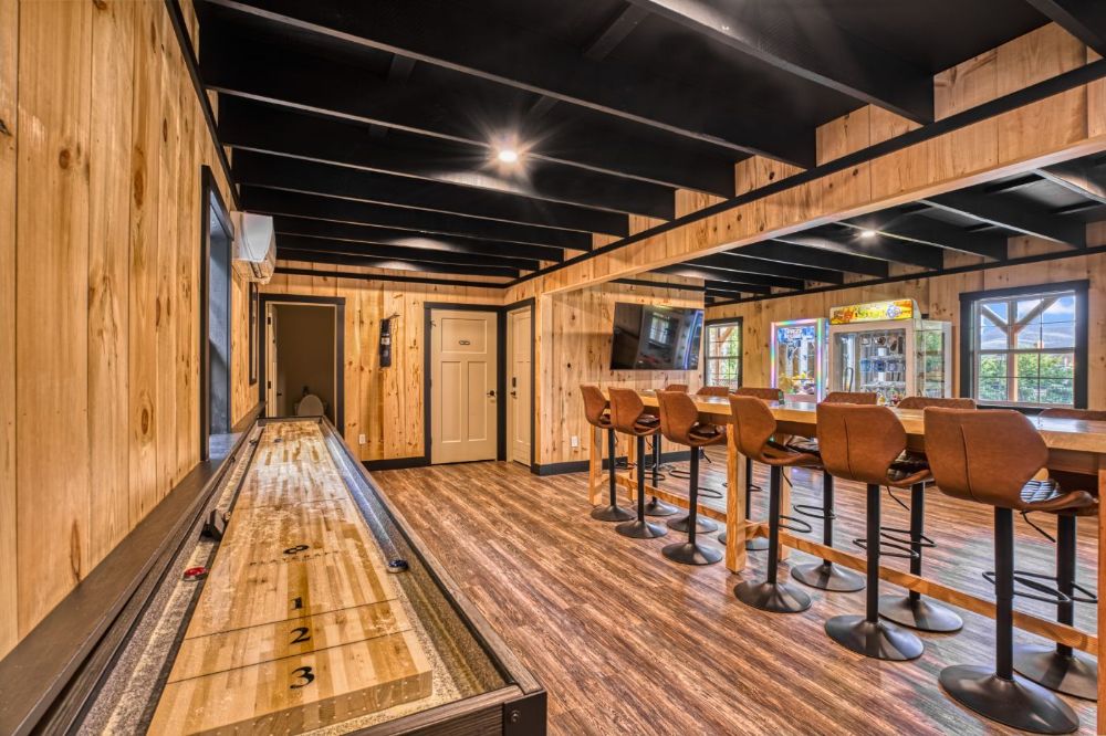 Game Room with contemporary and classic family games and movie room with large-screen TV.