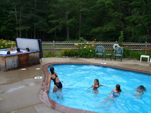 Enjoy our year round outdoor hot tub and our seasonal heated pool!