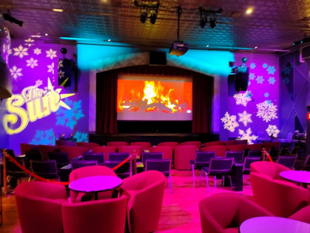 Fireplace projection on stage.jpg