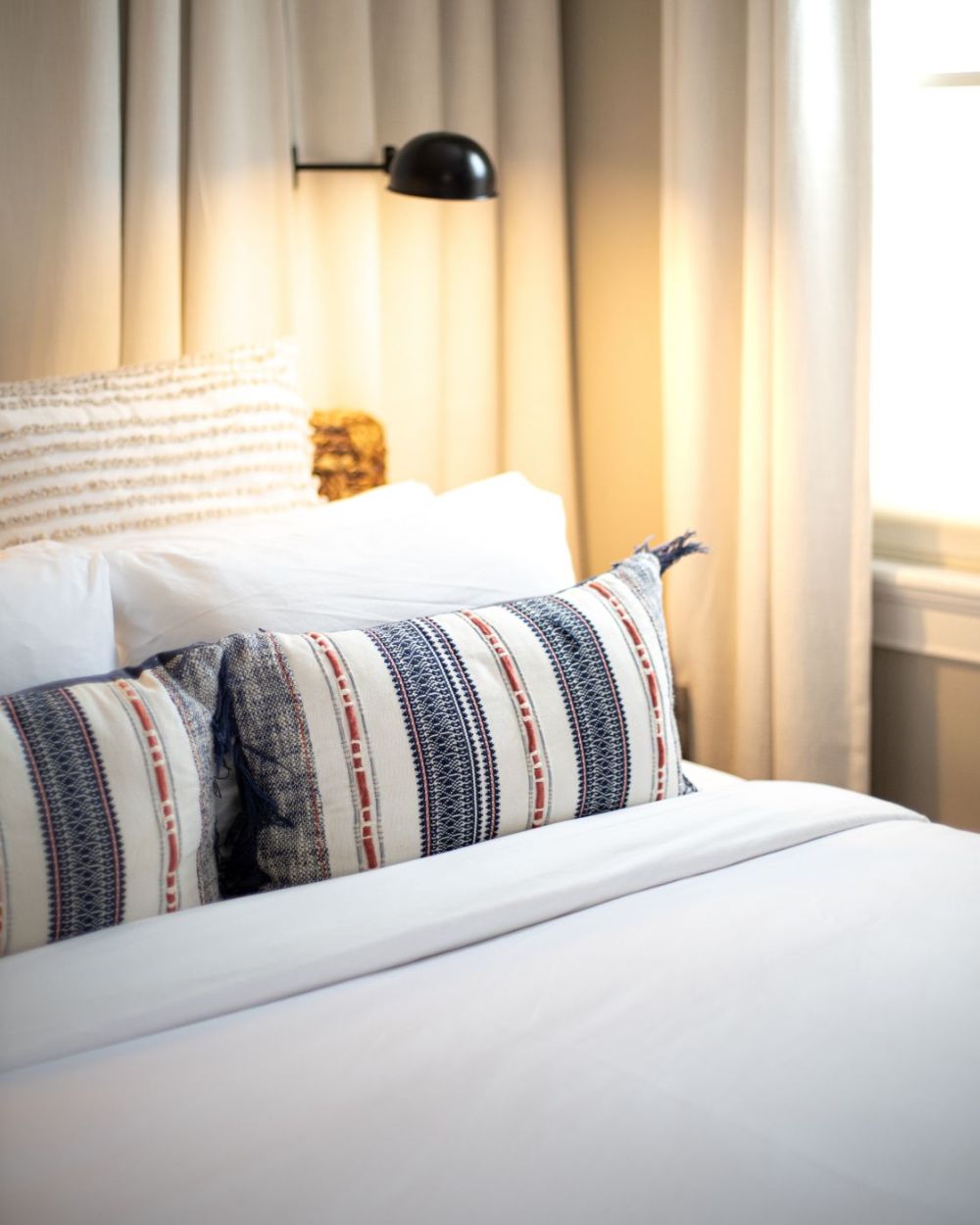 Queen bed in room 2 at The Sailmaker's House.