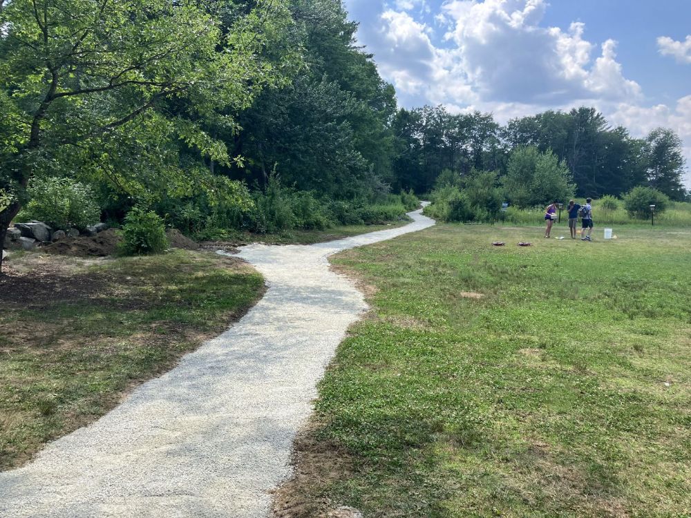 All Persons Trail through the Silk Farm Wildlife Sanctuary pollinator meadow at McLane Center.