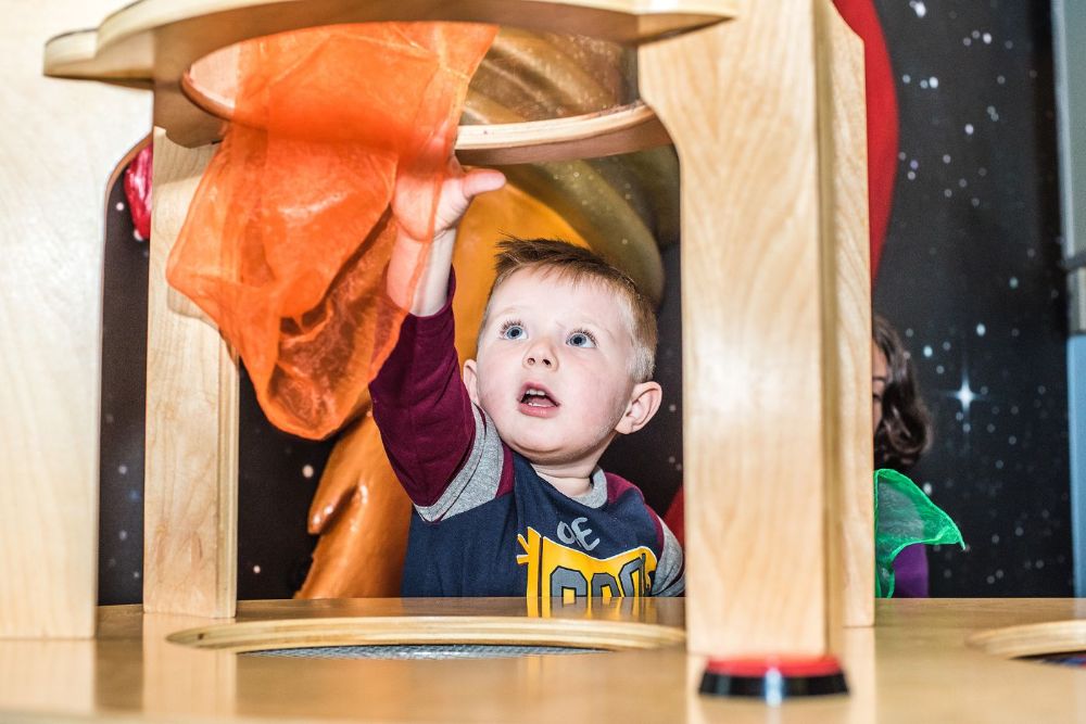 At the Children's Museum of New Hampshire in downtown Dover, kids of all ages can learn about aerodynamics with fun, hands-on exhibits like this Bernoulli Blower. Photo courtesy of taraphotography.com