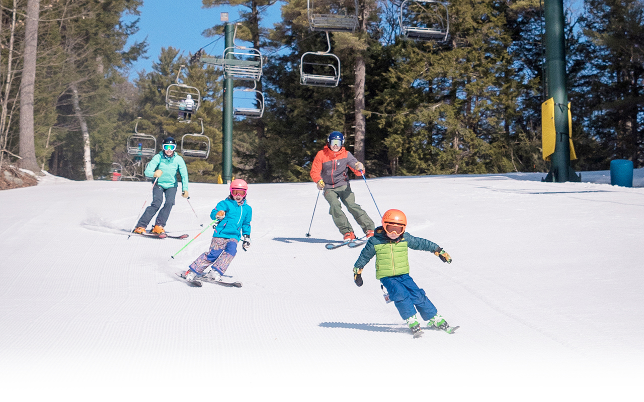 Skiing Family at King Pine Ski Area