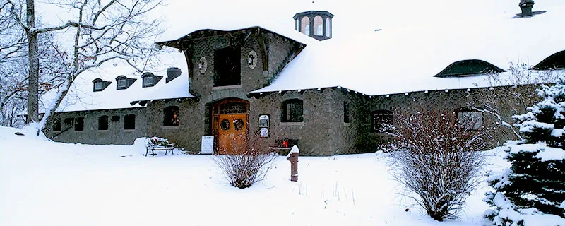 A winter scene with a snow-covered building