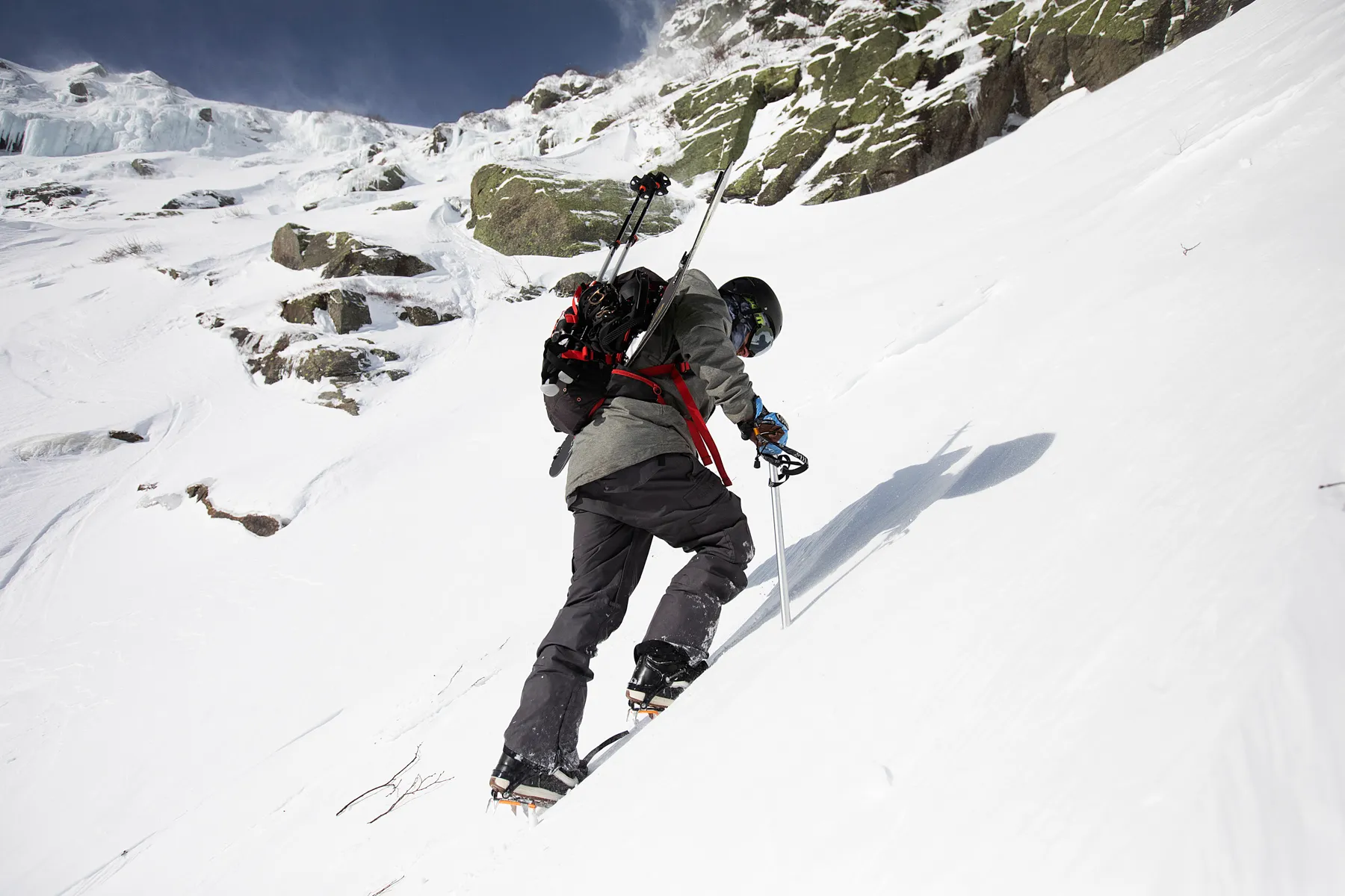 Man mountain climbing in the snow